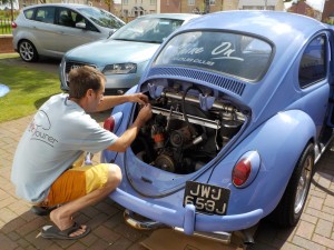 Buzz checking over the engine of his bug before heading off to Santa Pod